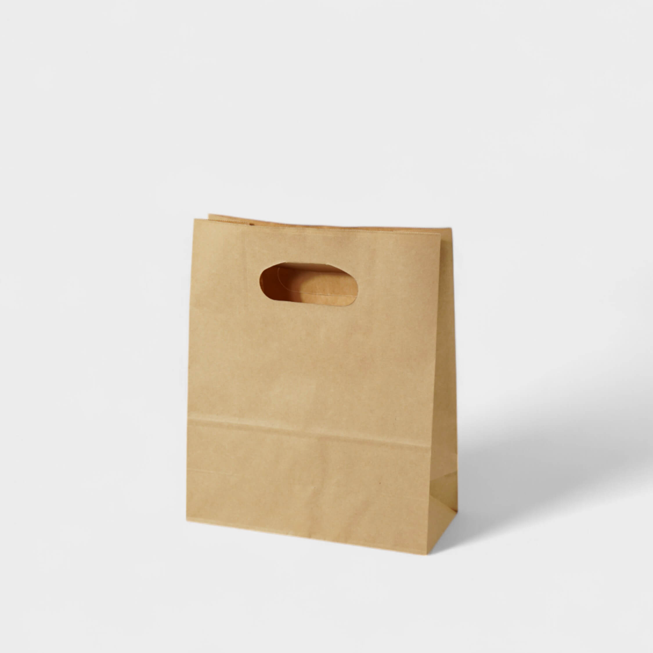 Natural Kraft Die-Cut Handle Takeout Bag - image 1