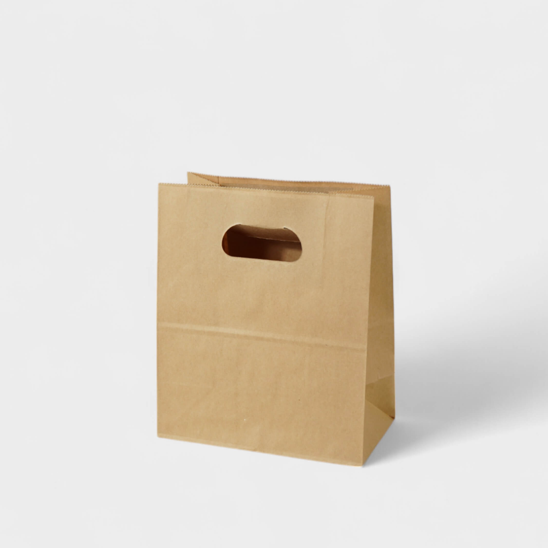 Natural Kraft Die-Cut Handle Takeout Bag - image 1