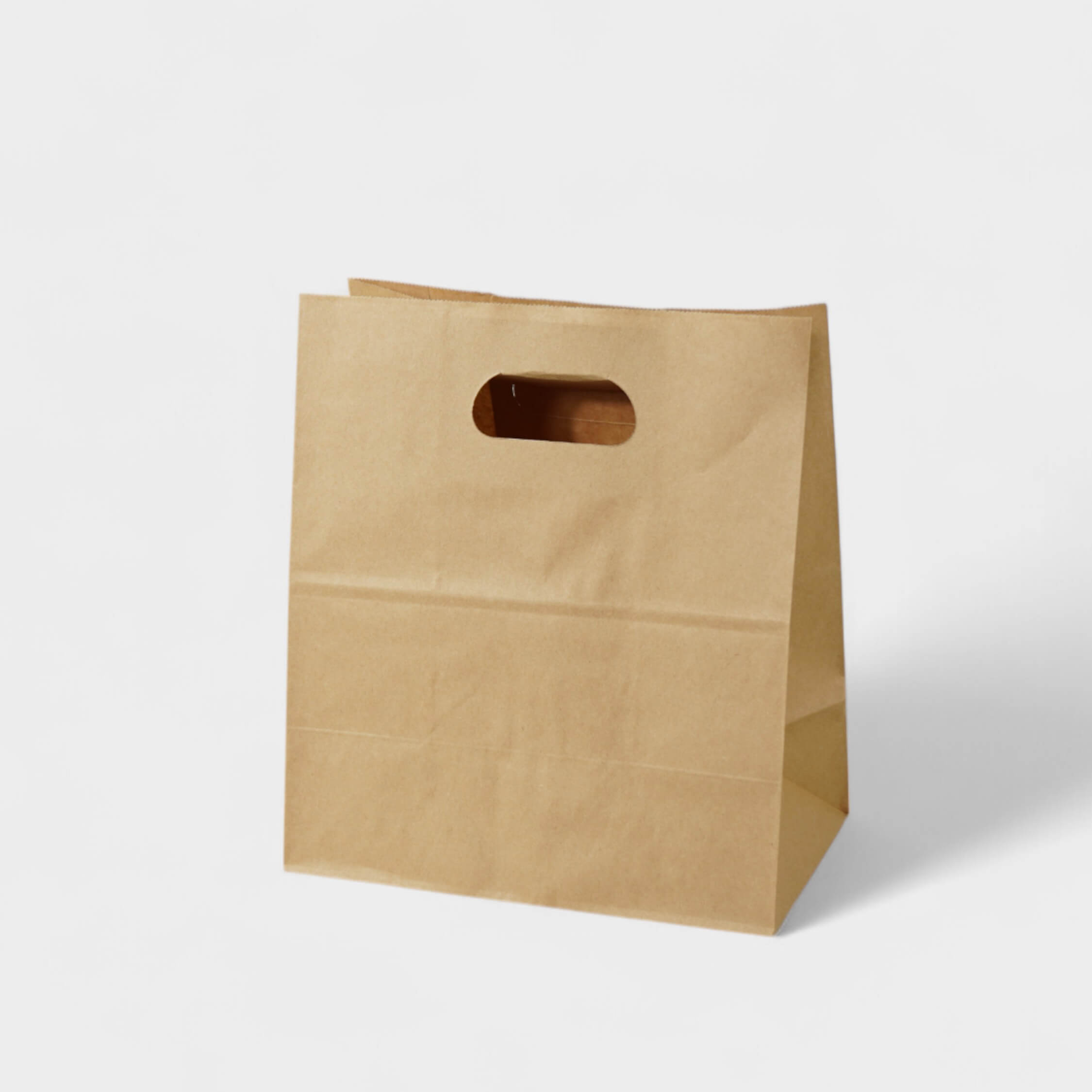 Natural Kraft Die-Cut Handle Takeout Bag - image 1