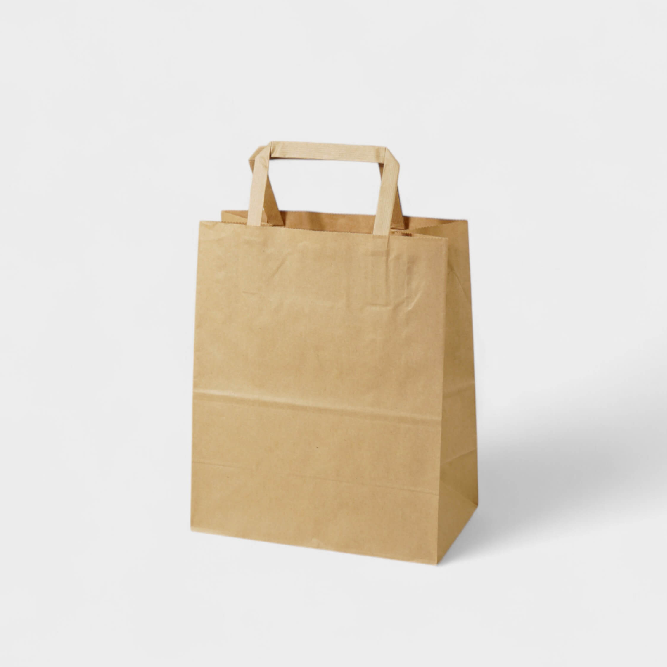 Natural Kraft Shopping Bag with Flat Paper Handles - image 1
